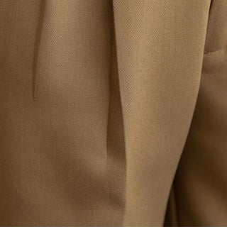 Close-up of beige fabric with a subtle texture