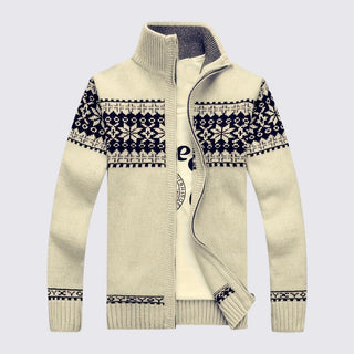 Beige sweater with black and white pattern on a light gray background