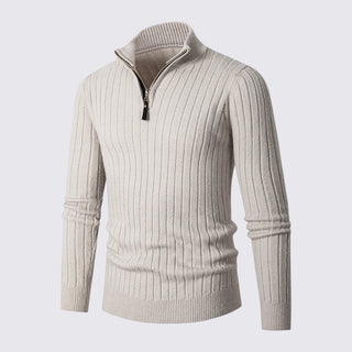 Beige ribbed sweater with a zipper on a light gray background