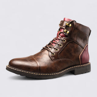 Brown leather boot with gold laces on a light gray background