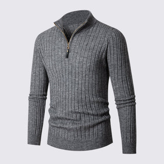 Gray ribbed sweater with a zipper on a light gray background