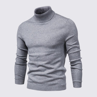 Gray turtleneck sweater on a light gray background