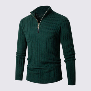 Green ribbed sweater with a zipper on a light gray background