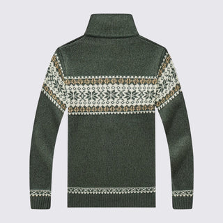 Green knit sweater with a patterned back on a light gray background