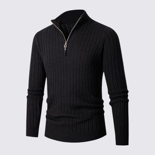 Black ribbed sweater with a zipper on a light gray background