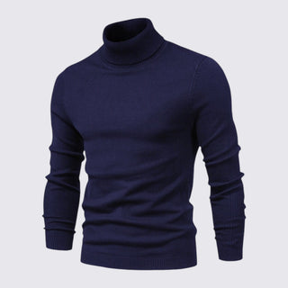 Navy blue turtleneck sweater on a light gray background