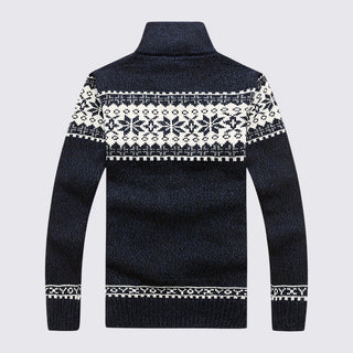 Black sweater with white pattern on a light gray background