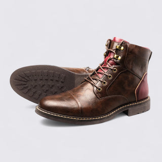 Brown leather boot with red lining on a light gray background
