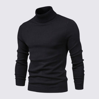 Black turtleneck sweater on a light gray background