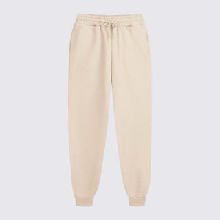 Beige sweatpants on a light gray background