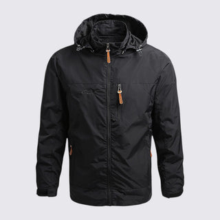 Black jacket with orange zippers on a light gray background