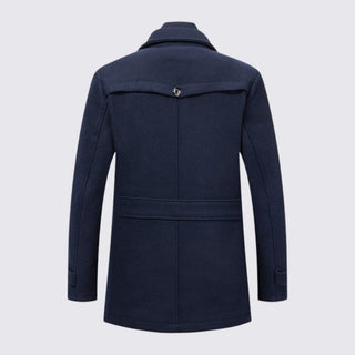 Navy blue coat on a light gray background