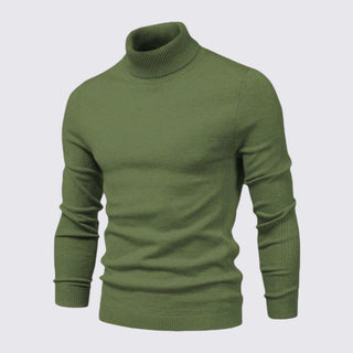 Green turtleneck sweater on a light gray background