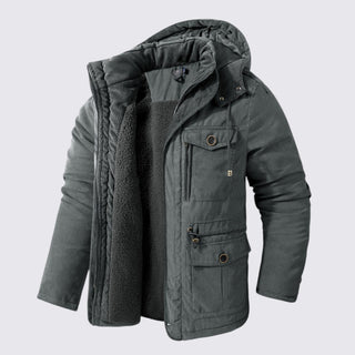 Gray winter jacket with fur-lined hood on a light gray background