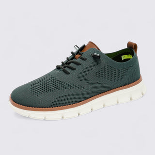 Green sneaker with brown accents on a light gray background